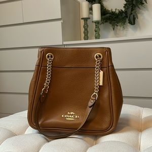 Brand new Coach purse. Never been used. Mint condition.